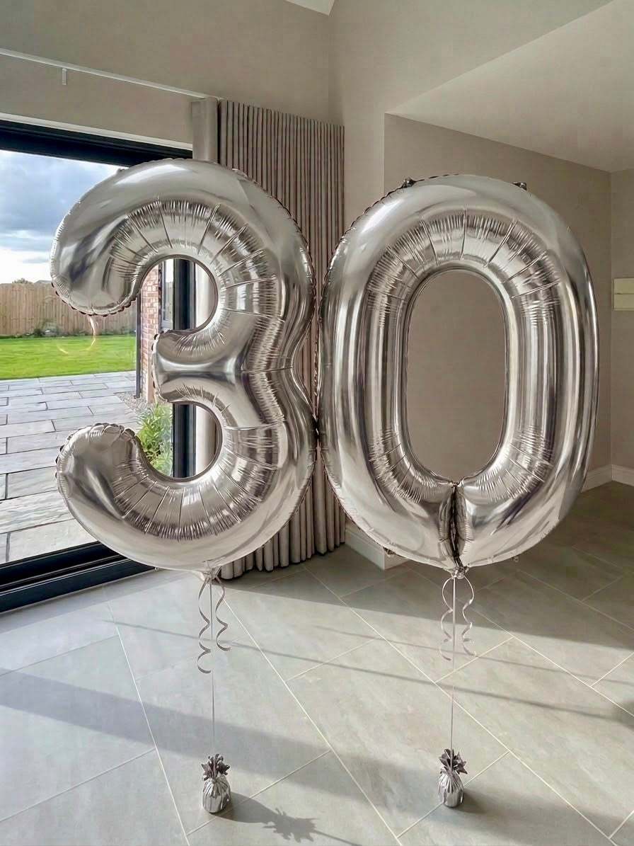 Silver helium number balloons spelling 30